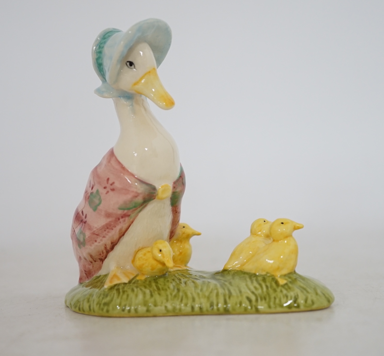 Sixteen John Beswick Beatrix Potter figures, including Jemima and her Ducklings, Peter in the watering can and Mrs Tiggywinkle Washing, all boxed. Condition - fair to good